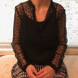 A black lace long sleeve blouse